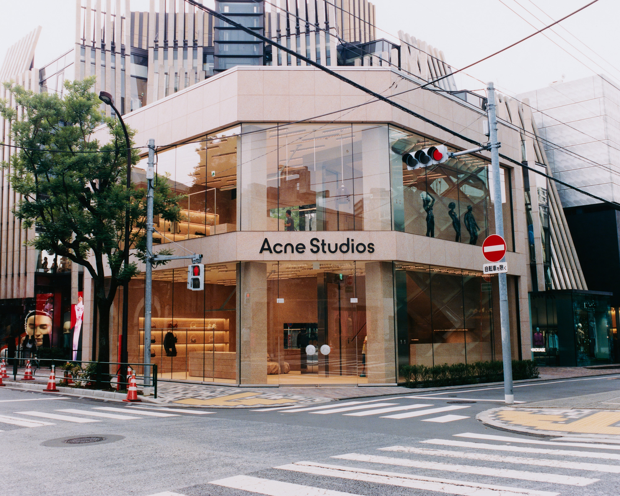 Acne Studios&rsquo; pink-granite Aoyama flagship in Tokyo, designed with Halleroed