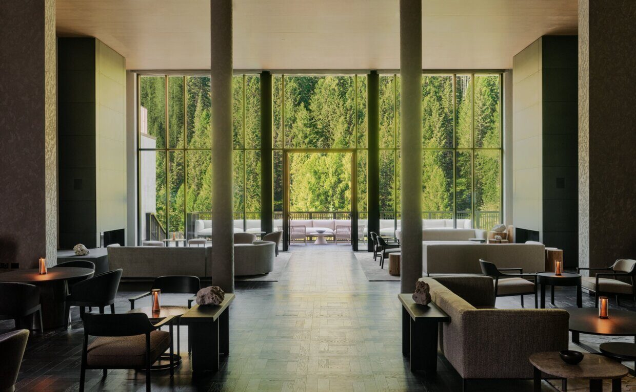 Il Salotto, the lounge bar at Aman Rosa Alpina, with views to the Alps