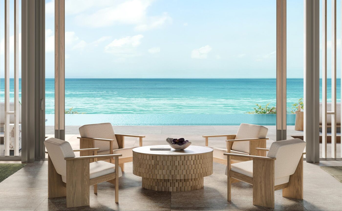 Living room of an Aman Residence at Amancaya, opening onto the water