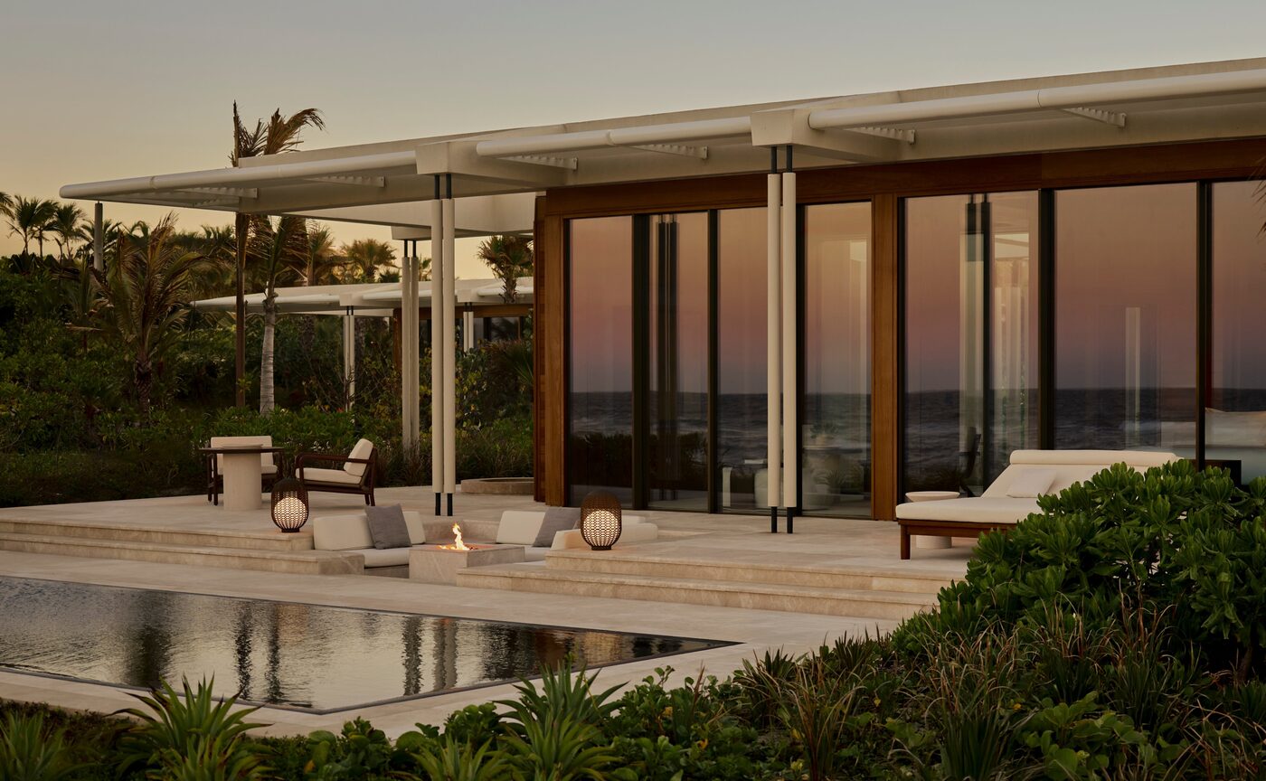 A beachfront casita at Amanvari on the East Cape of Baja California, with a pool and the Sea of Cortés beyond at dusk