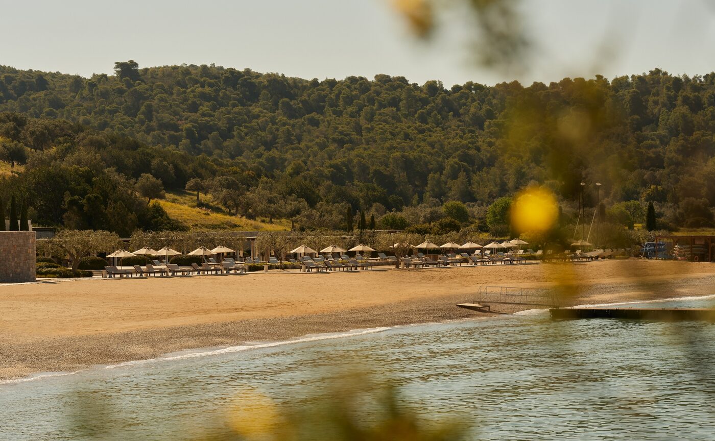 The Beach Club at Amanzoe, four swimming pools and shaded terraces running the length of a private beach on the Argolic Gulf, courtesy of Aman