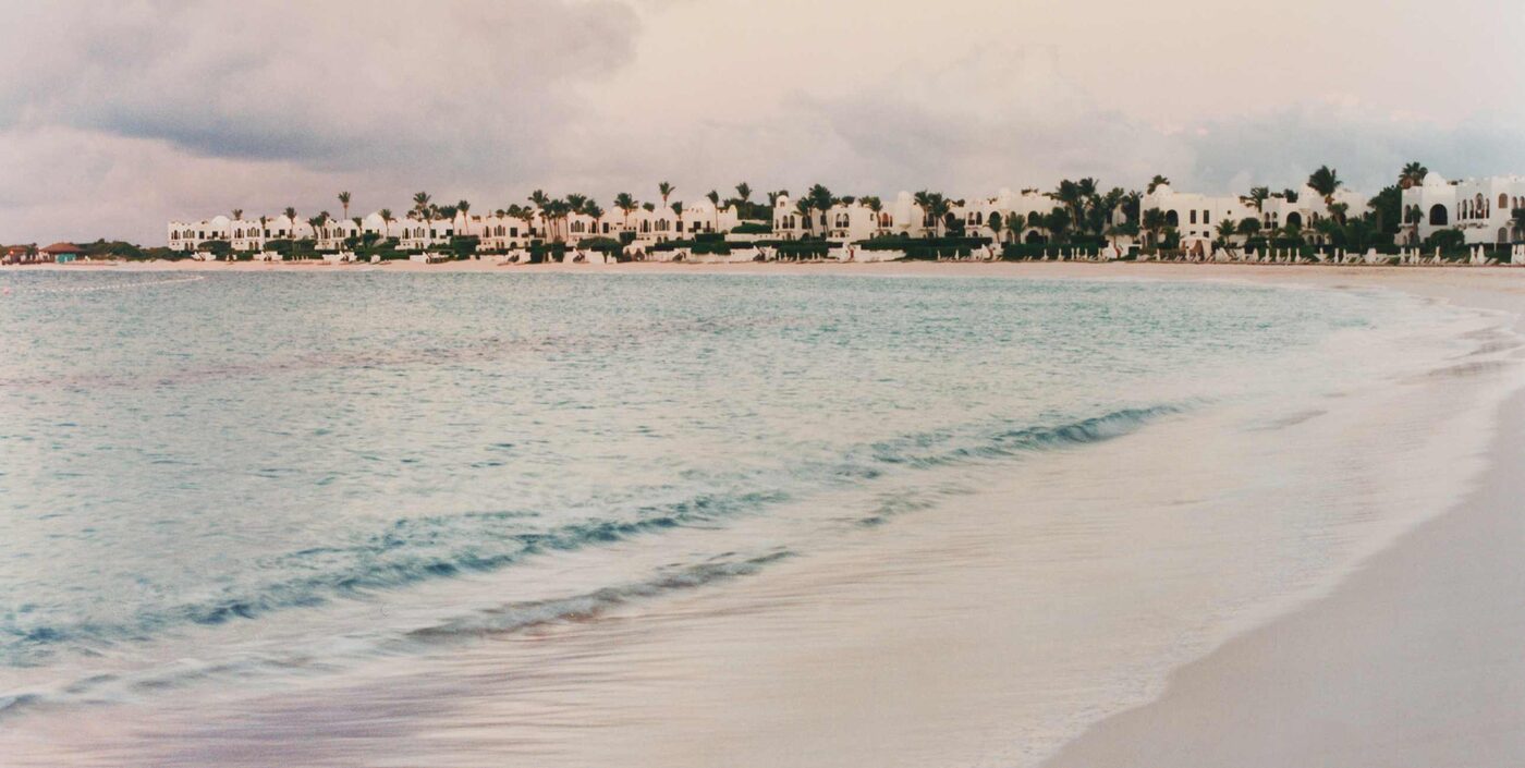 The white crescent of Maundays Bay at Cap Juluca, A Belmond Hotel, Anguilla