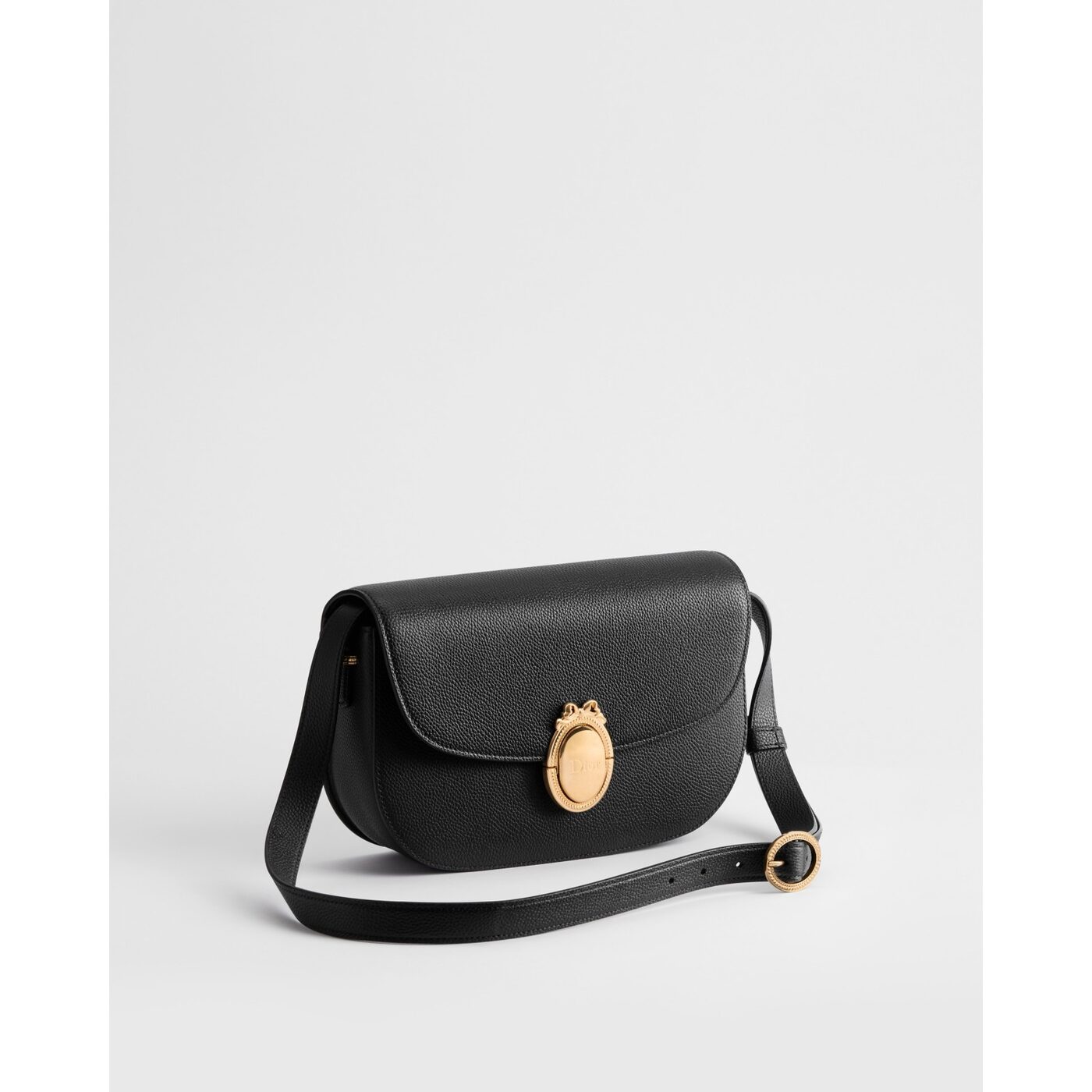 The Dior Médaillon Flap bag in black grained calfskin.