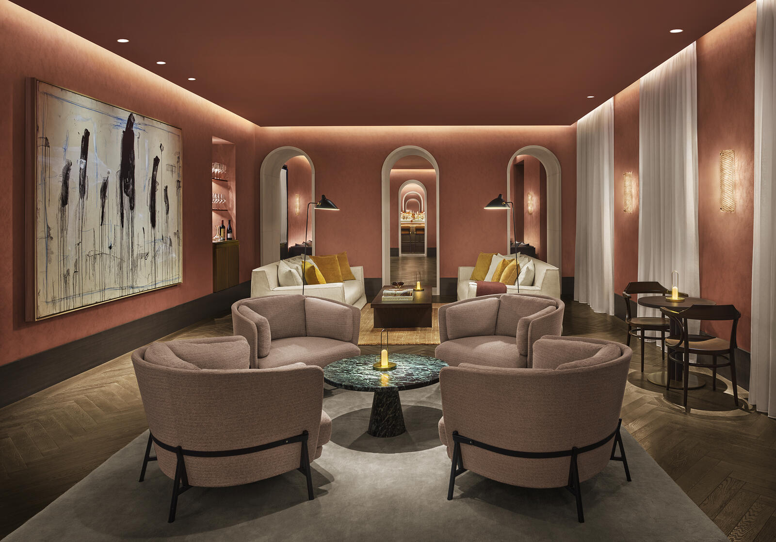 Cetino bar at The Lake Como EDITION — terracotta walls, arched doorways, evening atmosphere