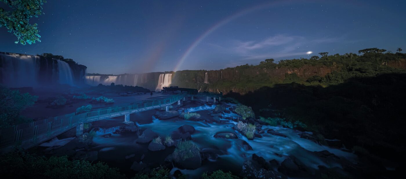 A lunar rainbow arching over the Iguassu Falls at night, seen from inside the national park, courtesy of Belmond
