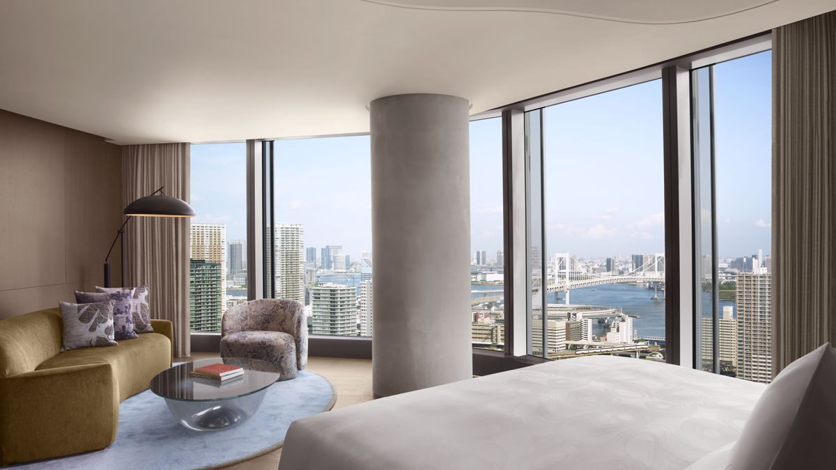 An Executive Suite at JW Marriott Hotel Tokyo with Rainbow Bridge visible through floor-to-ceiling windows