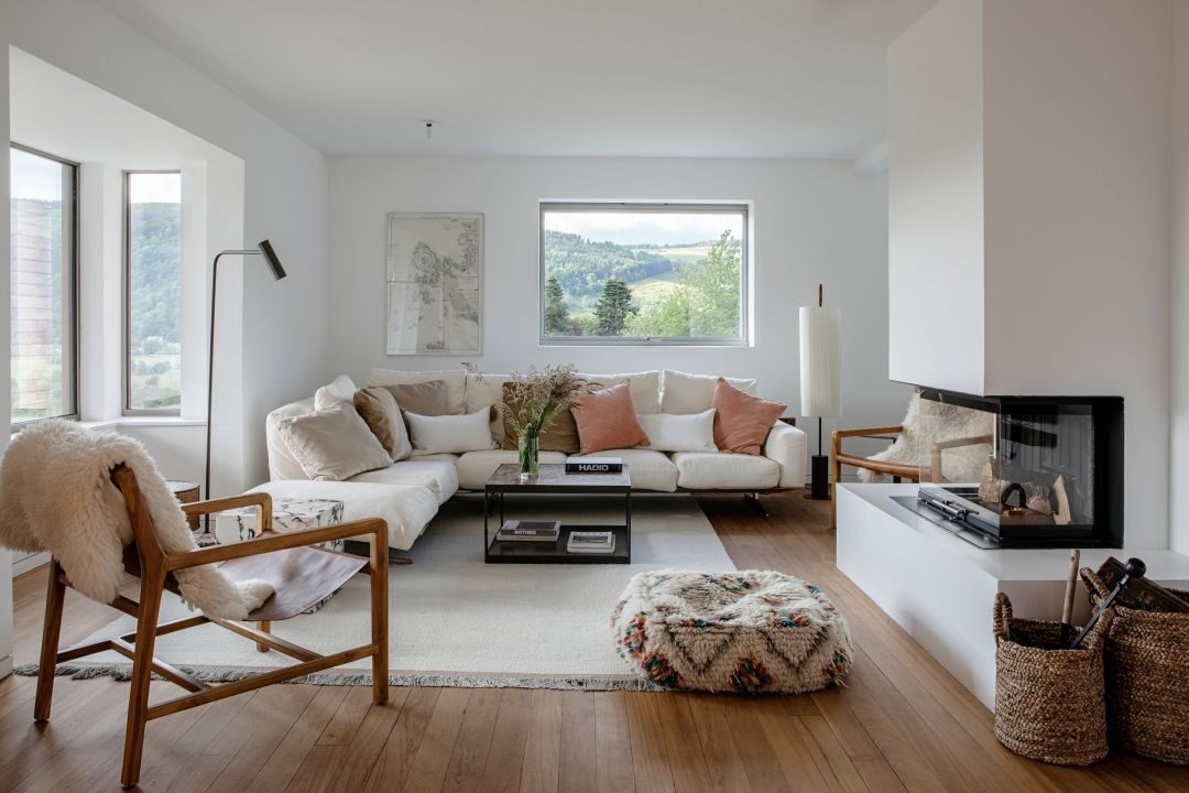 Interior of a lodge at Kilchoan Estate with Bute tweed sofas and British ceramics