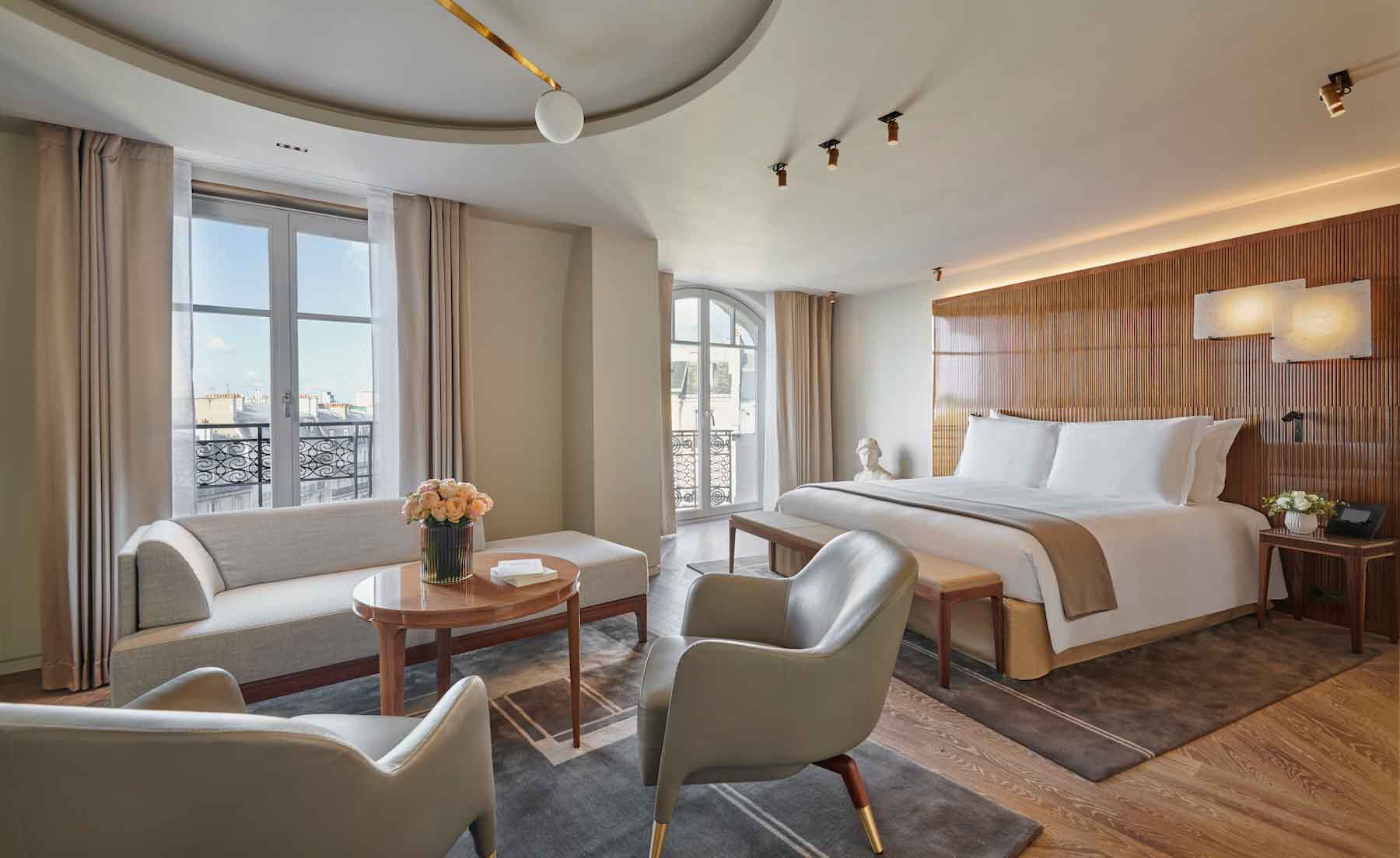 A Signature Suite bedroom at Mandarin Oriental Lutetia, Paris