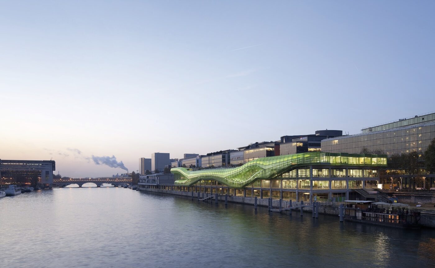 The Institut Francais de la Mode building on the Seine in Paris, the green glass Docks structure on the Quai d'Austerlitz