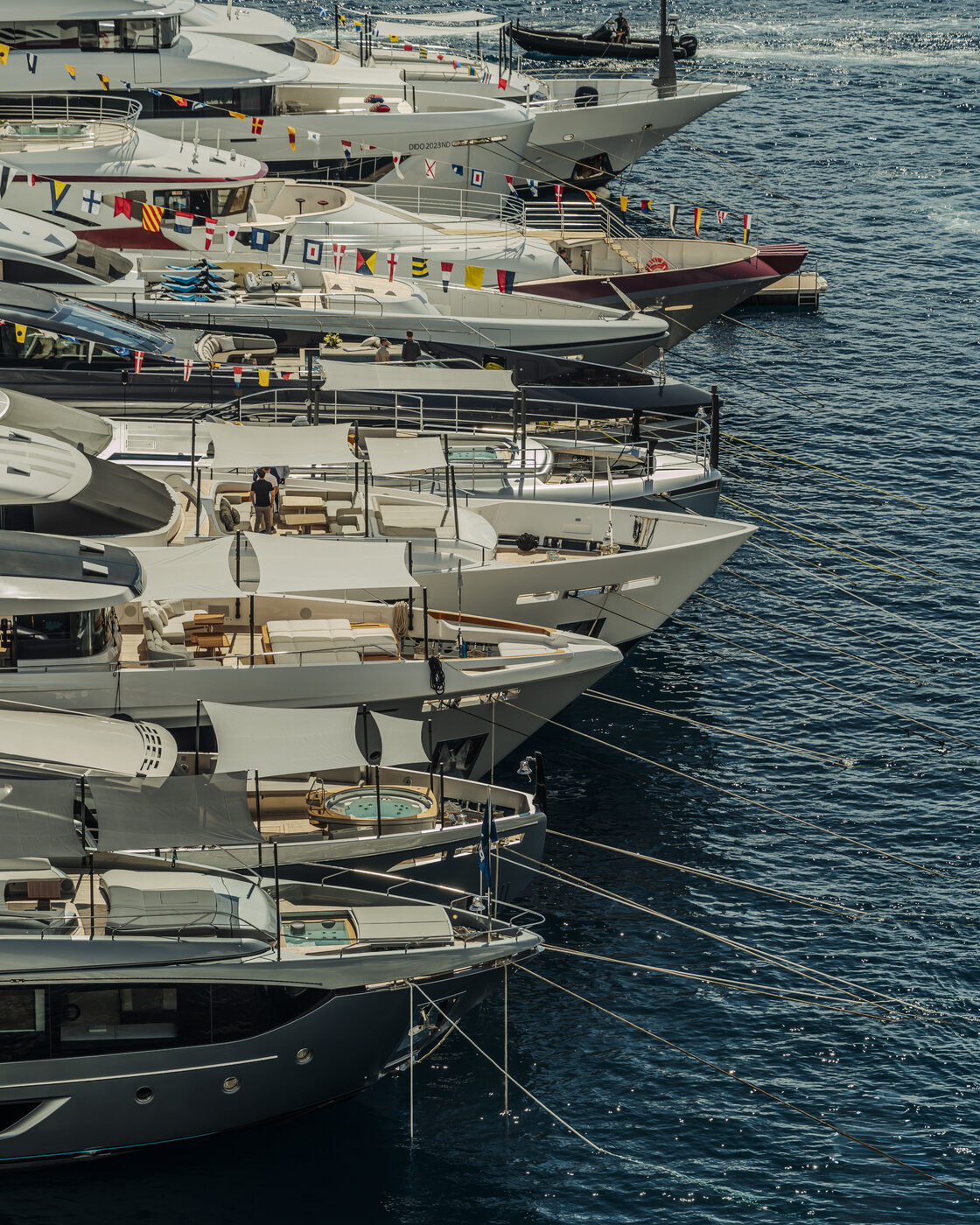 Superyachts moored in Monaco&rsquo;s Port Hercule during the Grand Prix &mdash; the harbour where fashion meets the circuit