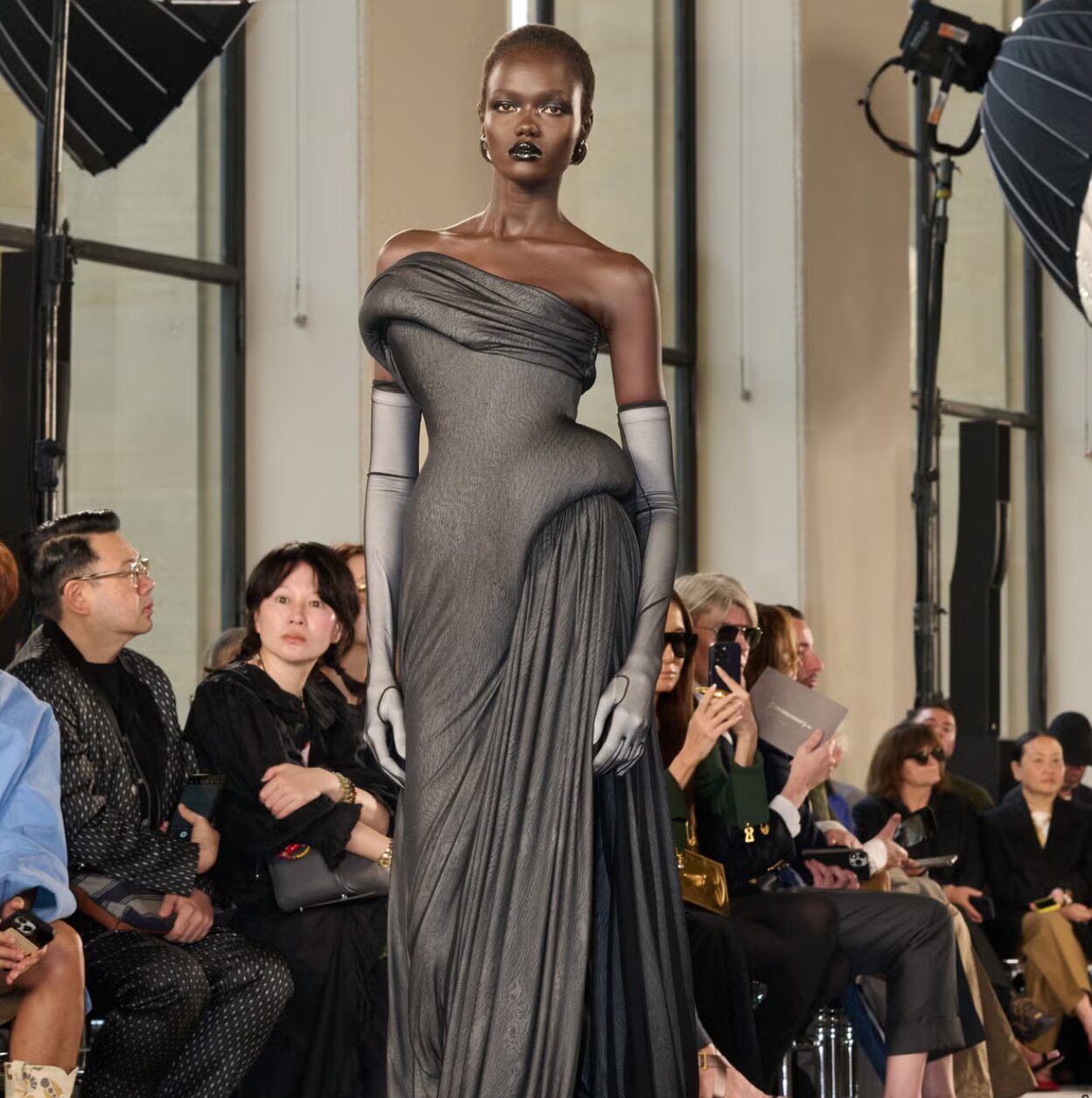 Schiaparelli Haute Couture runway look — draped grey gown with opera gloves at Paris Couture Week