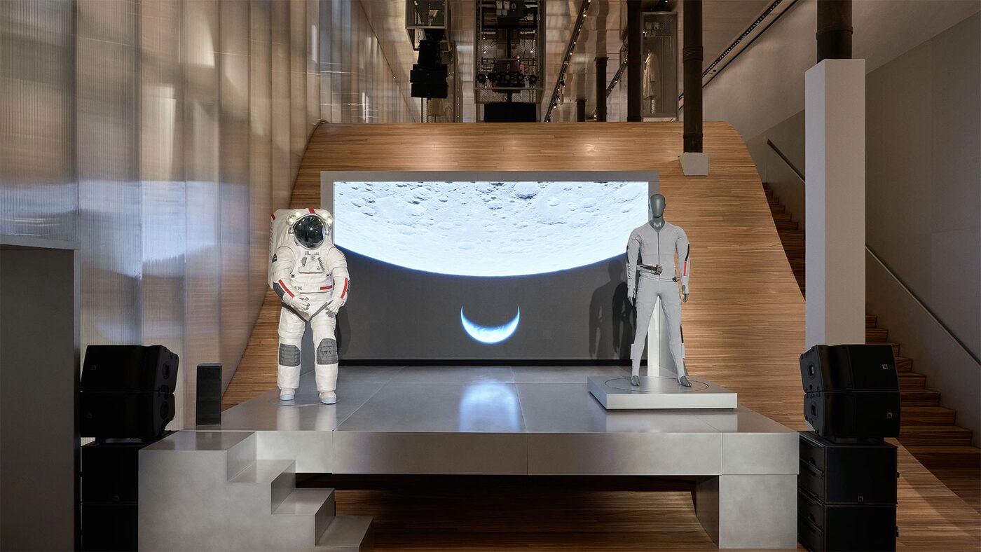 The AxEMU spacesuit and the Prada LCVG garment at the New York unveiling