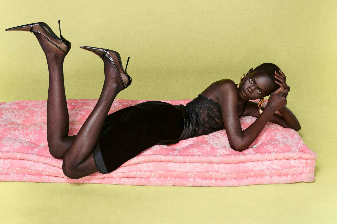 Saint Laurent Winter 2026 look, black lace dress and pointed patent heels