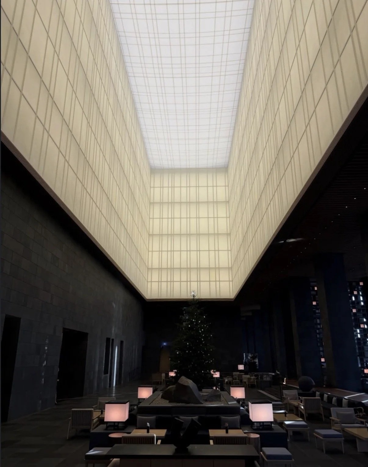 Tokyo hotel lobby with modern minimalist design and ambient lighting