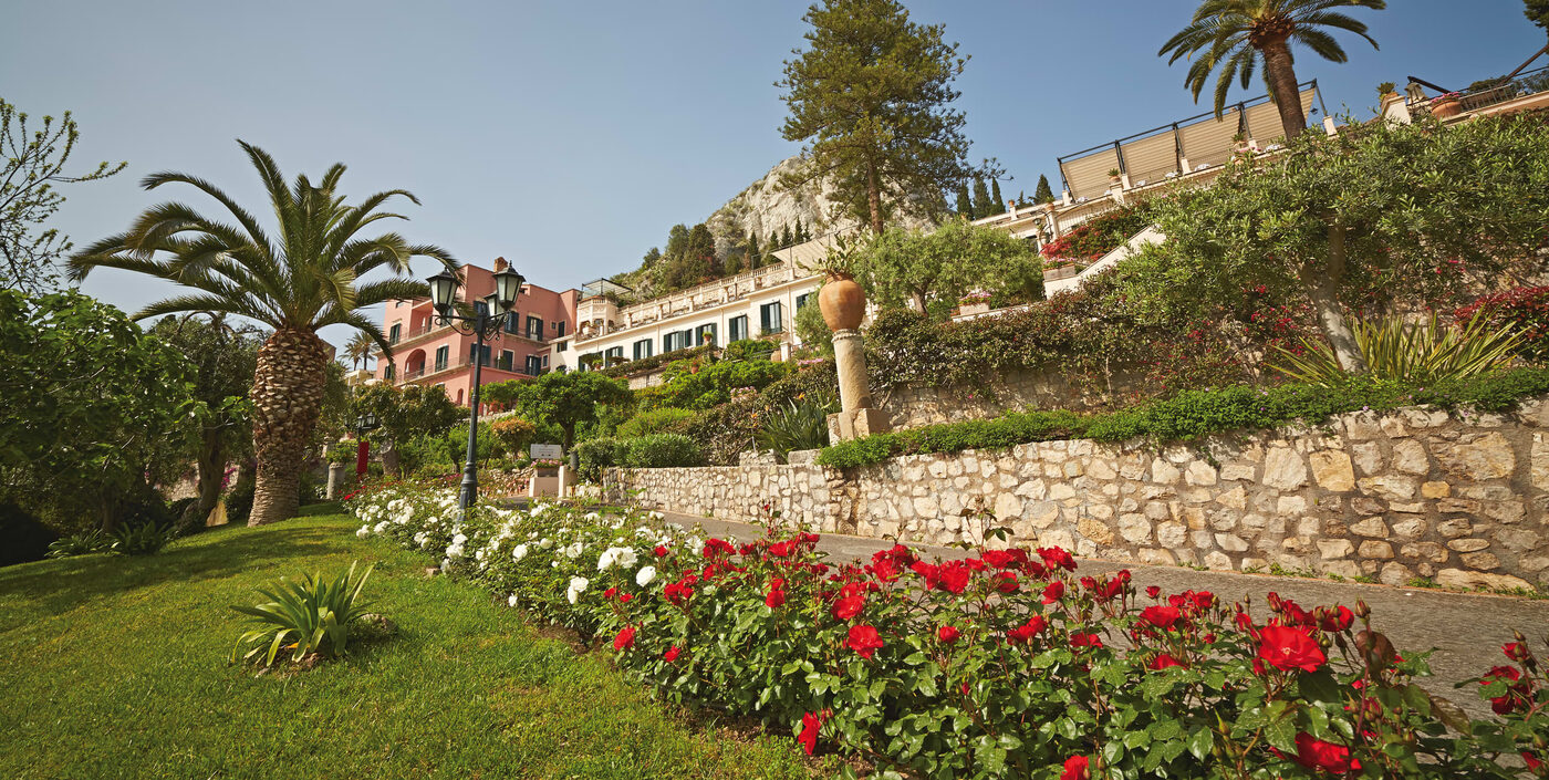 The Grand Hotel Timeo terrace looking out over Taormina toward Mount Etna
